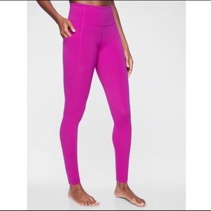 Athleta fuchsia stash pocket salutation tight